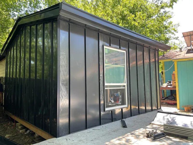 Black standing seam metal wall panels for Metal Roof Installation in Holbrook