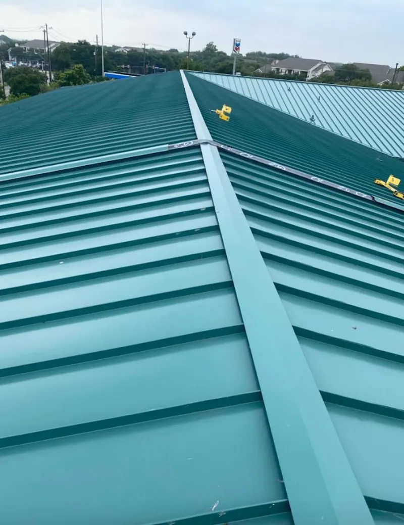 Green commercial metal roof ridge and valley for Metal Roof Repair in Holbrook